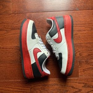 Black and red NIKE Air Force 1.